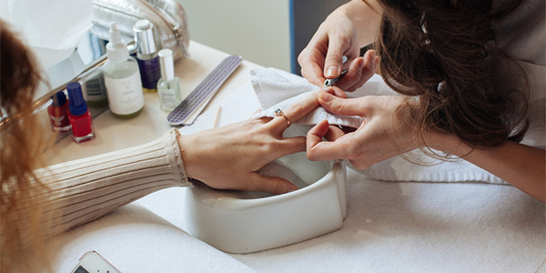 woman getting a manicure